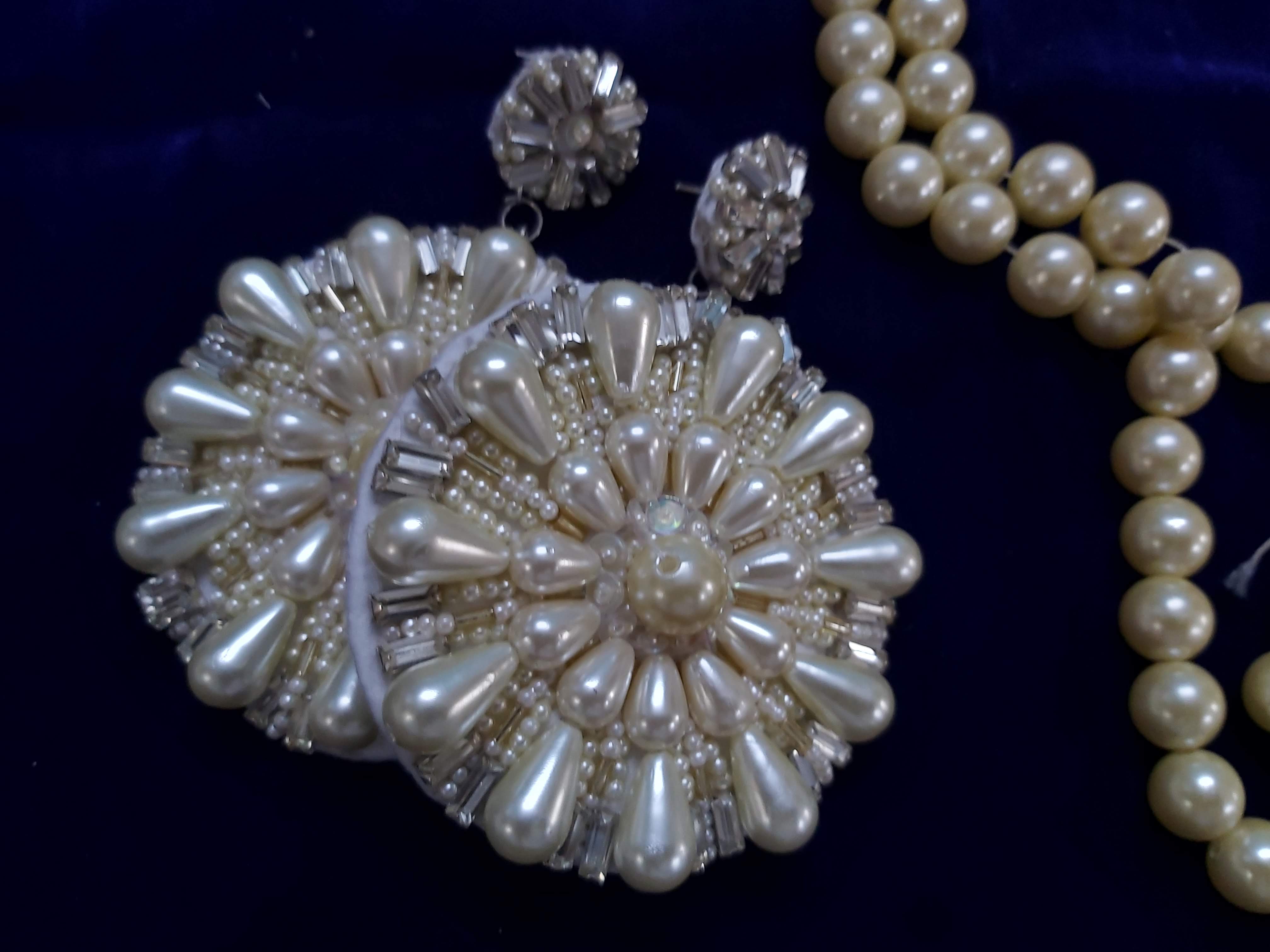 Circular hand embroidered bead earrings 